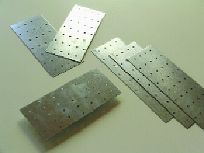 STEP 1: The perforated metal plates used to make these candleholders, called mending plates or tie plates, are available at the hardware store for less than a dollar. They come in a variety of shapes and sizes. The holders pictured used plates that were 3 or 4 inches wide and 5, 7, or 9 inches tall.